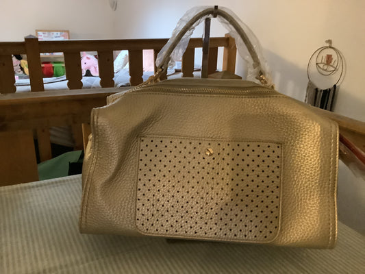 Mala d’Hopper com perfurações